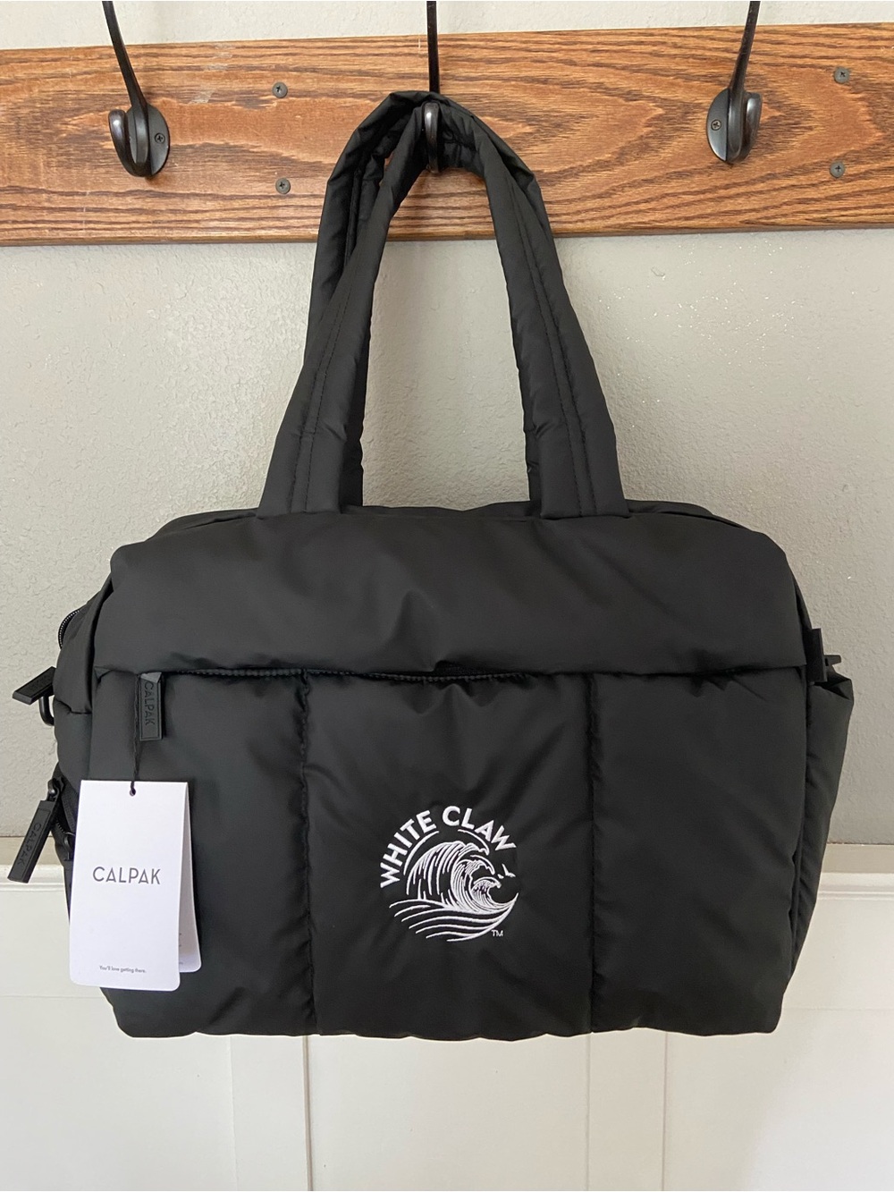Calpak Black Luka Duffel White Claw Logo
